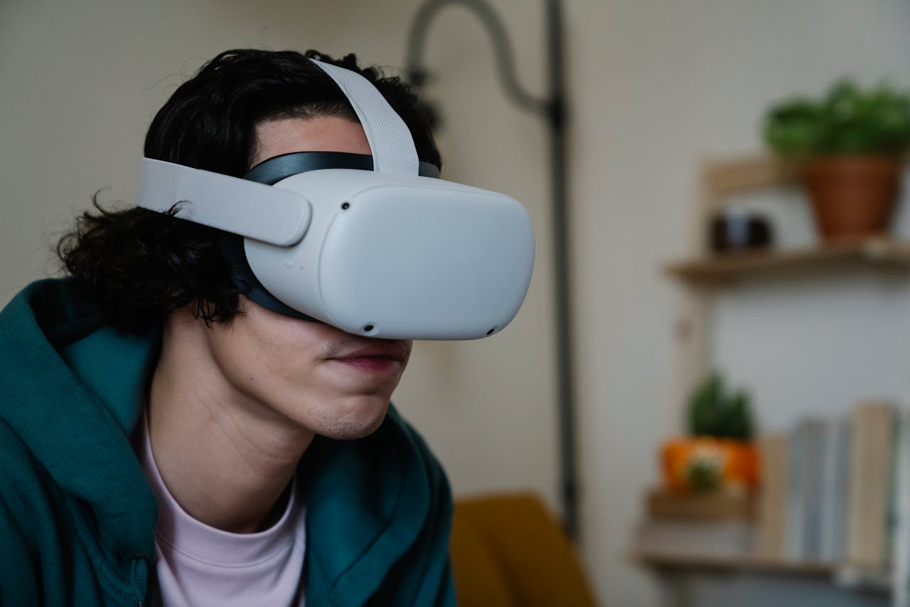 Focused man in VR helmet for testing virtual reality